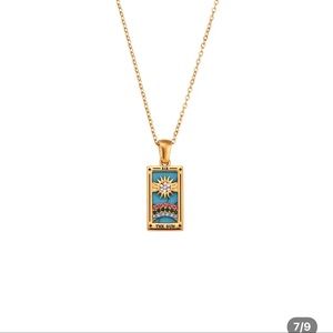 Gold necklace (The Sun) tarot card
